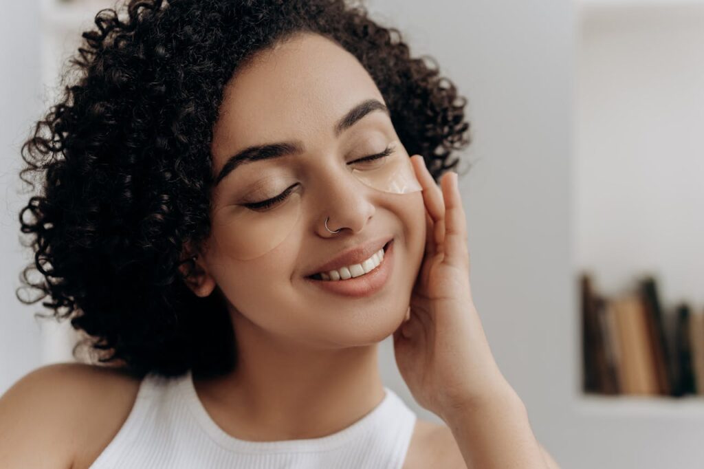 Smiling woman with glowing skin (after care)	